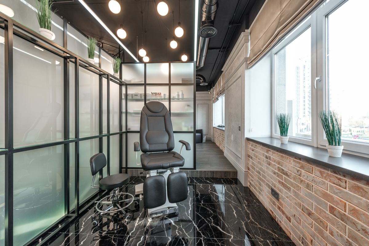 Clean, elegant treatment chair inside the studio